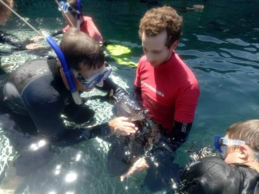 Sean handling the fish at Oceanic in Victor Harbor.